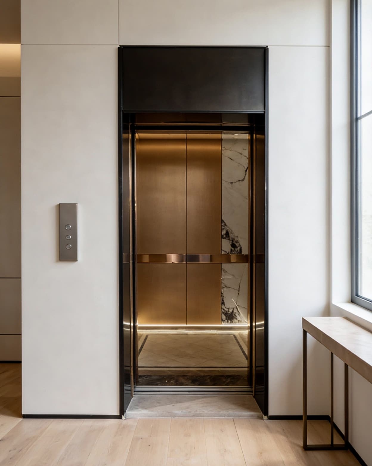A finished SINNVO landing door set flush into a white villa hallway wall, call button beside it